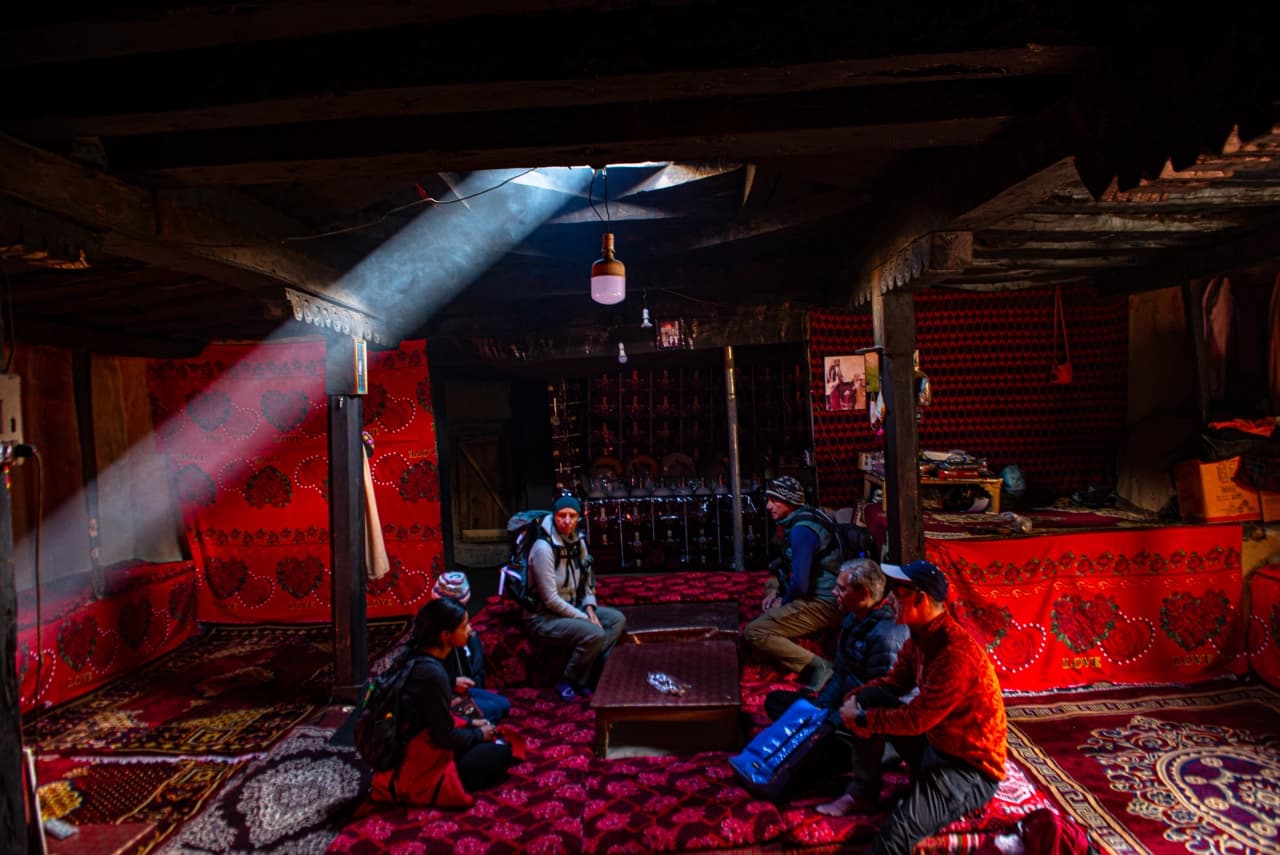 Travelers on a high mountain road in northern Pakistan — Wandering Yaks privacy policy